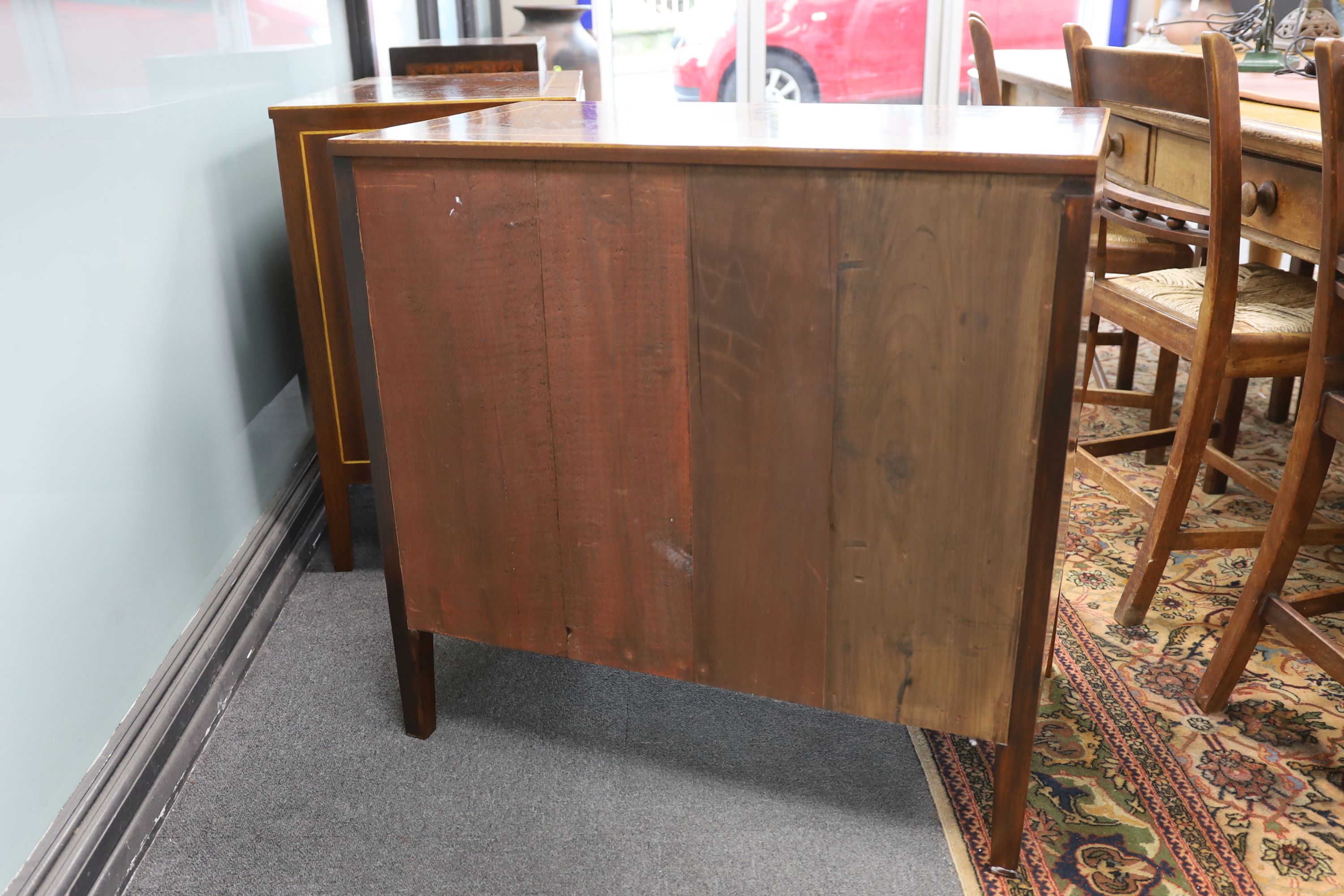 A pair of George IV style inlaid mahogany three drawer chests, width 79cm, depth 46cm, height 78cm